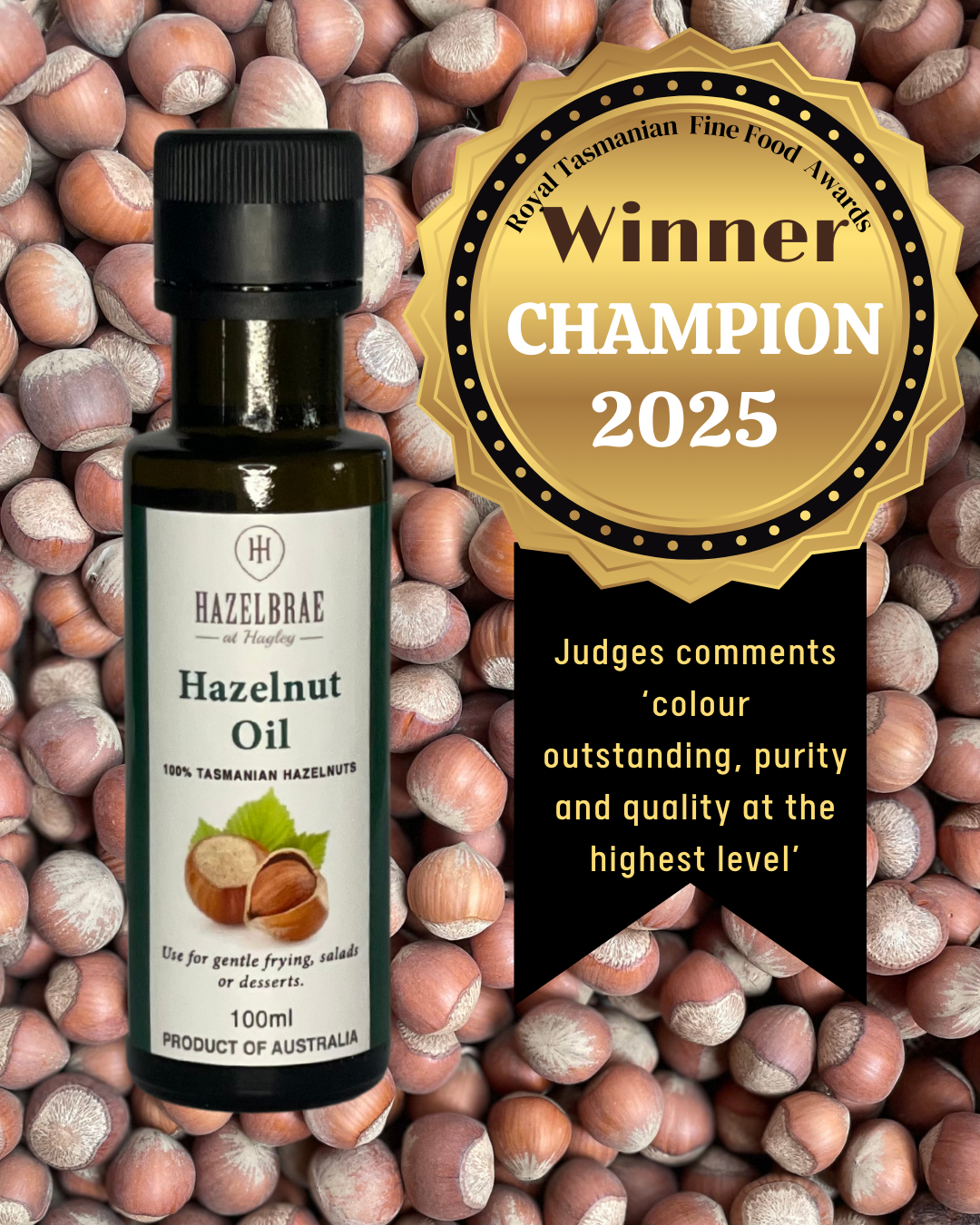 Bottle of Hazelbrae Hazelnut Oil with a gold award badge on a background of hazelnuts